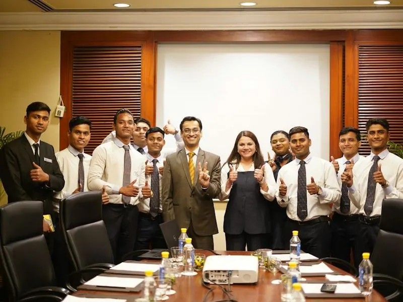 Team of professionals gathered in a conference room in India
